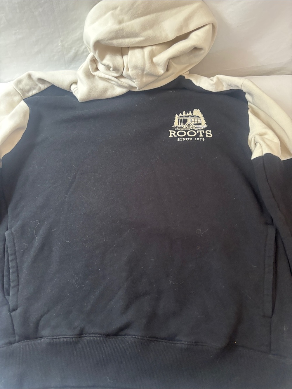 Roots Two-Tone Crewneck Hoodie in Black and Cream 50 Years. 80% cotton.